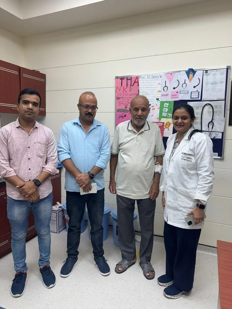 Dr. Trisha Srivastava with a patient and his family